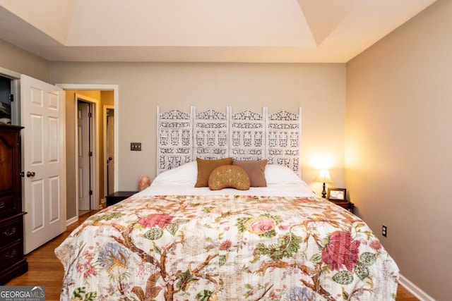 1041 Oconee Forest Ln, Watkinsville, GA 30677 - bedroom featuring wood finished floors and vaulted ceiling
