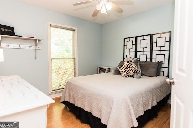 1041 Oconee Forest Ln, Watkinsville, GA 30677 - bedroom with wood finished floors and ceiling fan