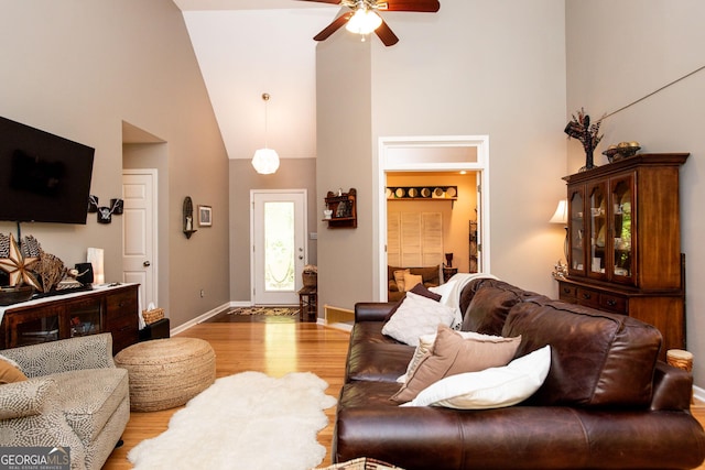 1041 Oconee Forest Ln, Watkinsville, GA 30677 - living room featuring high vaulted ceiling, a ceiling fan, wood finished floors, and baseboards