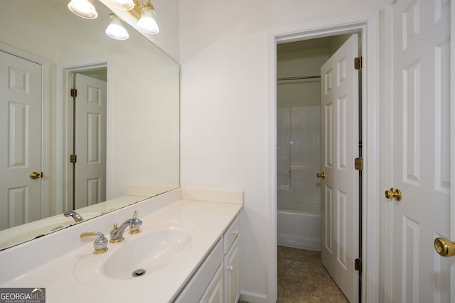 bathroom with vanity,  shower combination, and tile patterned flooring