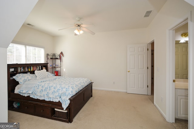 bedroom featuring visible vents, baseboards, light colored carpet, and ceiling fan