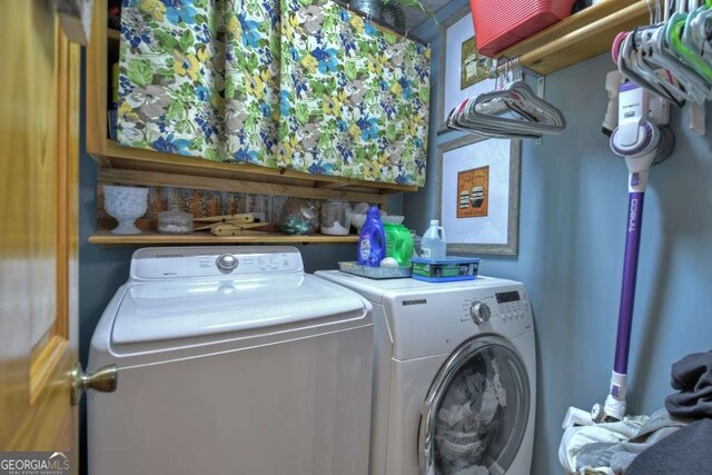 laundry area featuring independent washer and dryer and laundry area