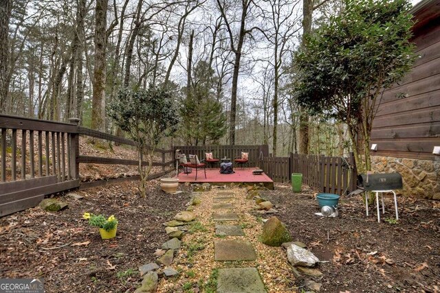 view of yard featuring a deck