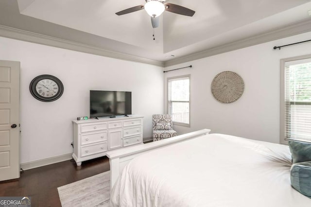 bedroom with crown molding, multiple windows, dark wood-style floors, and baseboards