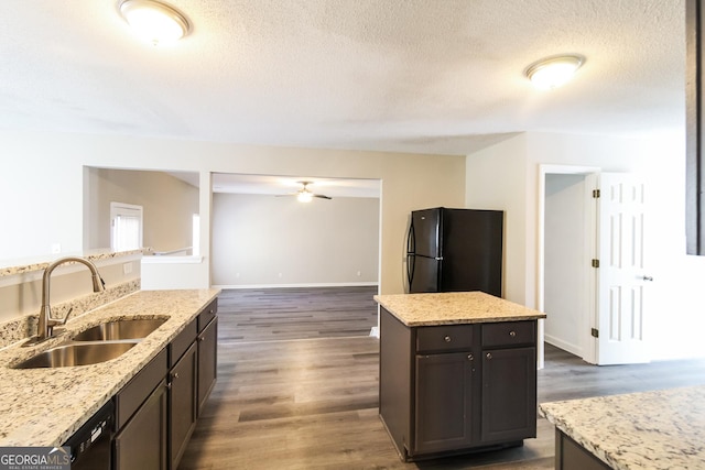 5345 Bridle Point Pkwy, Snellville, GA 30039 - kitchen featuring dark wood-style floors, black appliances, ceiling fan, and a sink