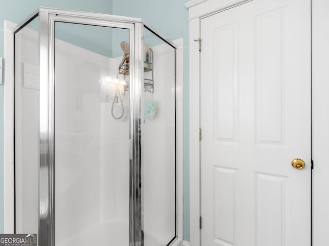 full bathroom with a stall shower