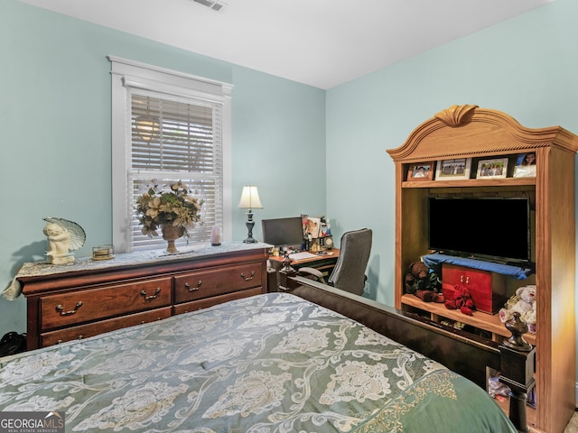 bedroom with visible vents