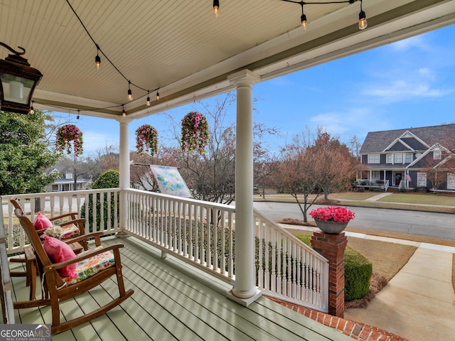 wooden deck featuring covered porch