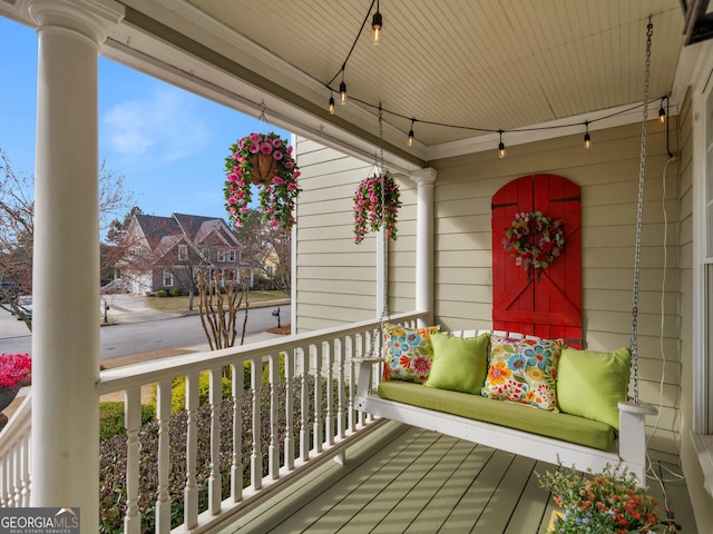 wooden deck featuring a porch