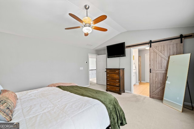 3810 Branch Bluff Ln, Cumming, GA 30040 - bedroom with a ceiling fan, baseboards, vaulted ceiling, light carpet, and a barn door