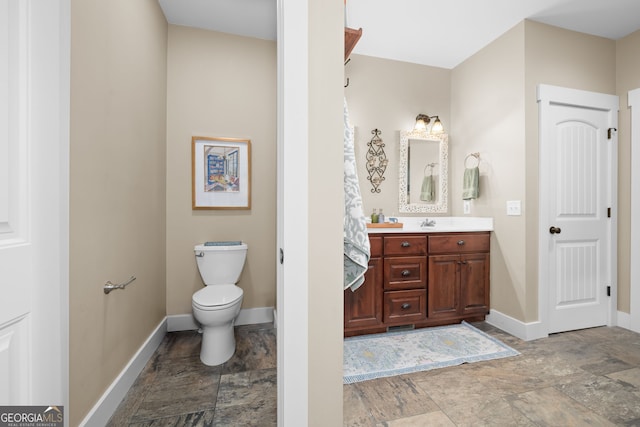 153 Whistle Pig Ter, Blairsville, GA 30512 - bathroom with toilet, vanity, stone finish flooring, and baseboards