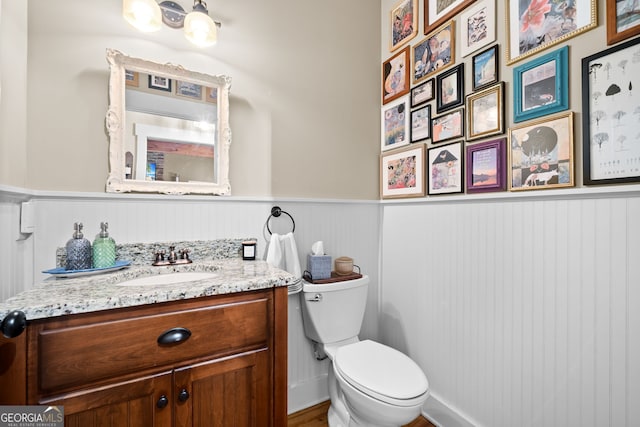 153 Whistle Pig Ter, Blairsville, GA 30512 - half bathroom featuring vanity, toilet, and wainscoting