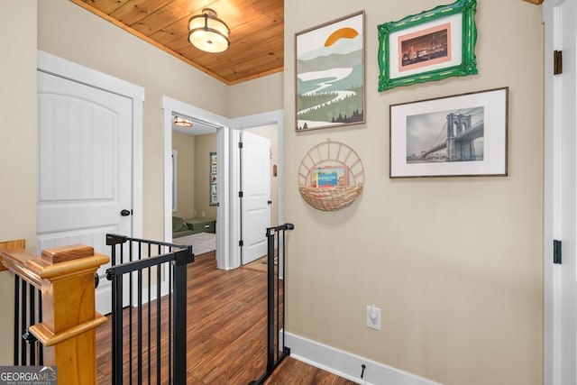 153 Whistle Pig Ter, Blairsville, GA 30512 - hall with wooden ceiling, dark wood-style floors, an upstairs landing, and baseboards