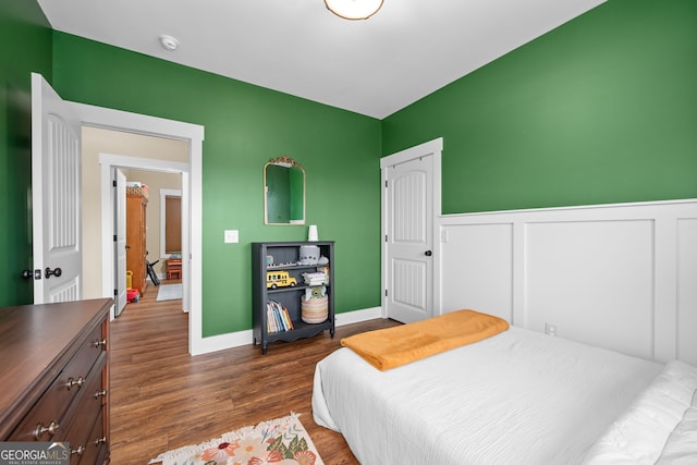 153 Whistle Pig Ter, Blairsville, GA 30512 - bedroom with dark wood-type flooring and a wainscoted wall