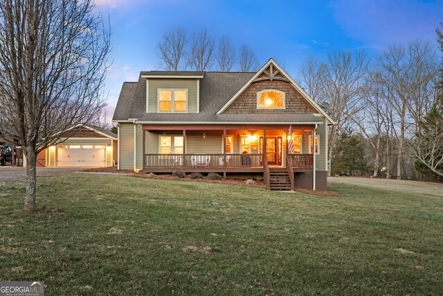 153 Whistle Pig Ter, Blairsville, GA 30512 - rear view of property featuring a lawn, a detached garage, covered porch, an outdoor structure, and a shingled roof