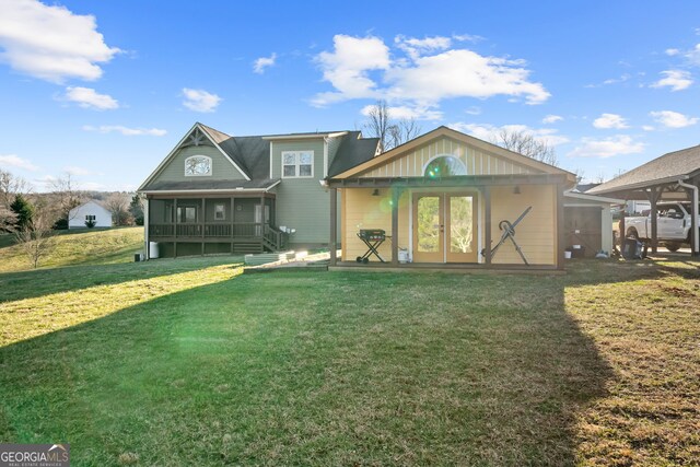 153 Whistle Pig Ter, Blairsville, GA 30512 - back of property with french doors, a yard, and a sunroom