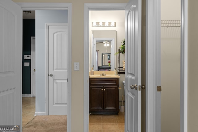 bathroom featuring vanity and tile patterned flooring