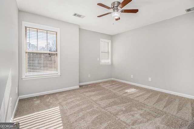 4319 Alysheba Dr, Fairburn, GA 30213 - carpeted empty room with healthy amount of natural light and ceiling fan