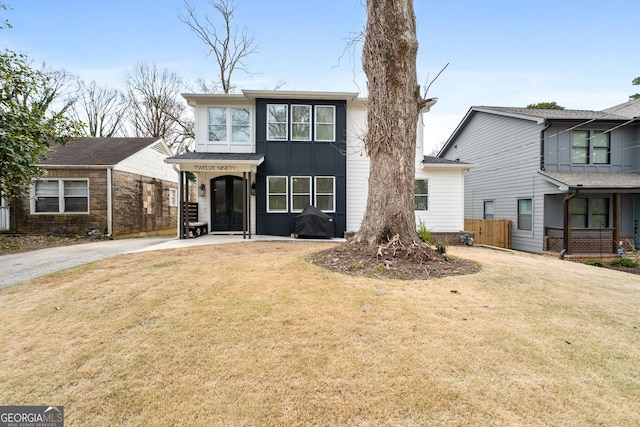 1290 Westboro Dr SW, Atlanta, GA 30310 - view of front of home featuring driveway, a front yard, and fence