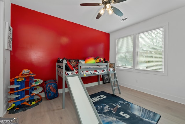 1290 Westboro Dr SW, Atlanta, GA 30310 - bedroom with visible vents, ceiling fan, baseboards, and wood finished floors