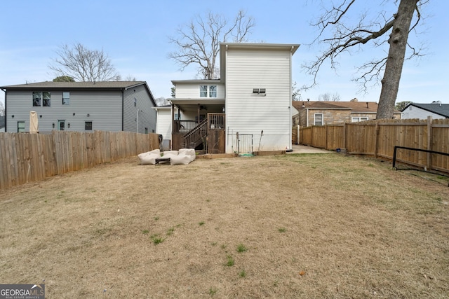 1290 Westboro Dr SW, Atlanta, GA 30310 - back of house featuring a yard and a fenced backyard