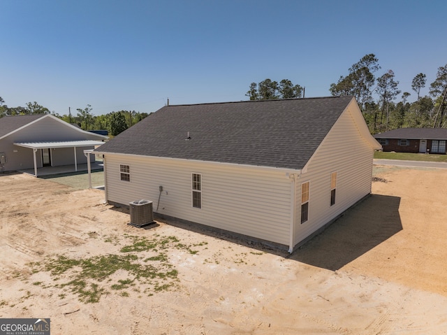 42 Walton Way, Hazlehurst, GA 31539 - back of house featuring a shingled roof