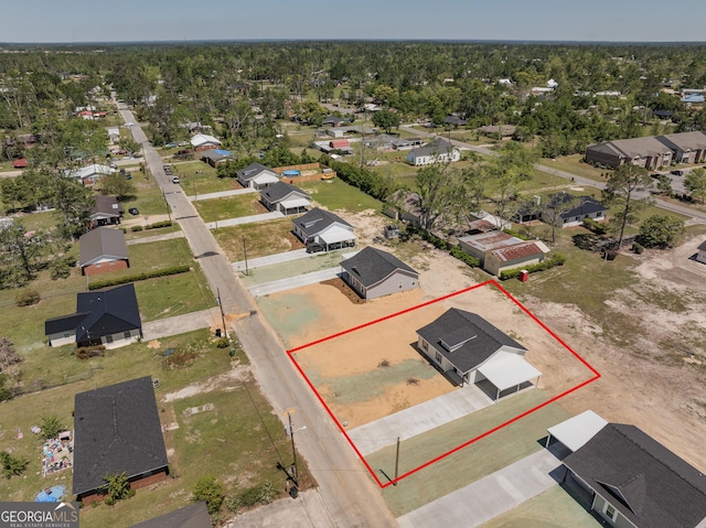 birds eye view of property with a residential view