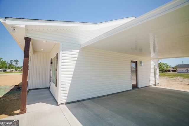 42 Walton Way, Hazlehurst, GA 31539 - view of patio / terrace featuring an attached carport
