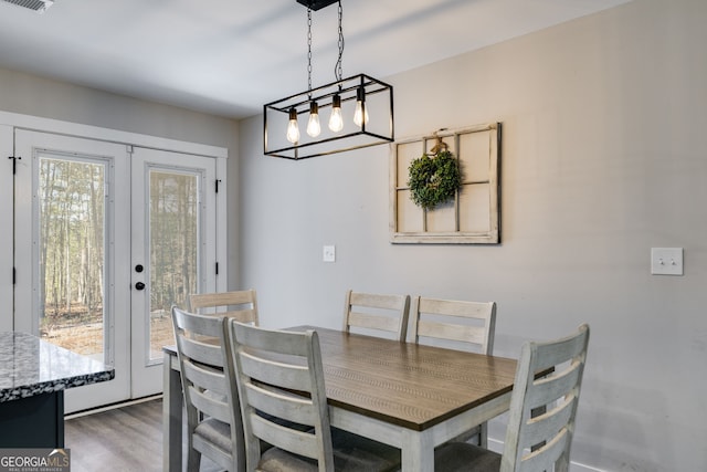 132 Pinnacle Way, Carrollton, GA 30117 - dining space featuring visible vents and wood finished floors