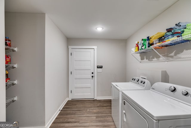 132 Pinnacle Way, Carrollton, GA 30117 - laundry room featuring baseboards, wood finished floors, laundry area, and washer and clothes dryer