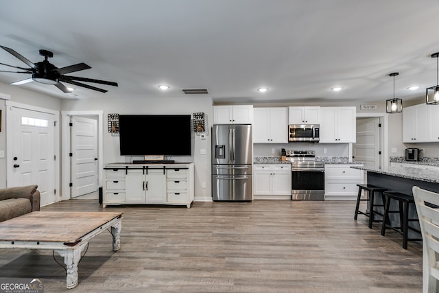 132 Pinnacle Way, Carrollton, GA 30117 - living room with visible vents, recessed lighting, light wood-type flooring, and a ceiling fan