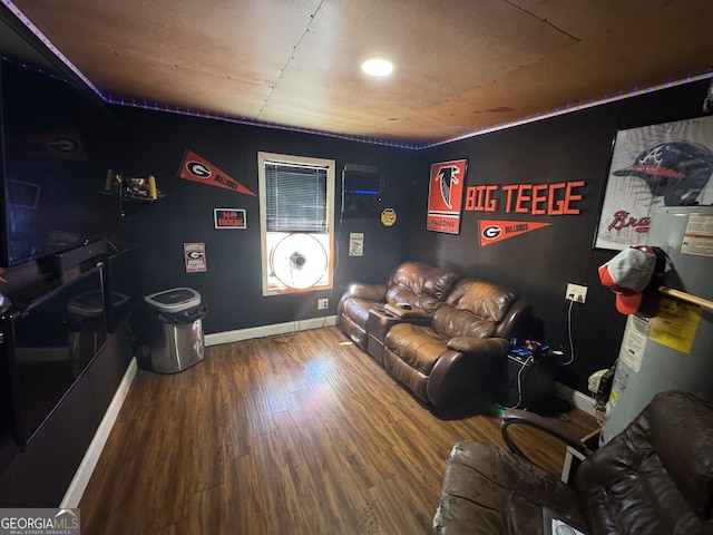 living room with baseboards and wood finished floors