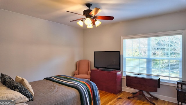 129 Willow Ridge Cir, Thomasville, GA 31757 - bedroom featuring baseboards, a ceiling fan, and light wood finished floors