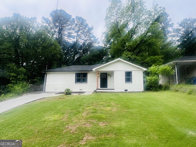 single story home with crawl space, a front yard, brick siding, and roof with shingles