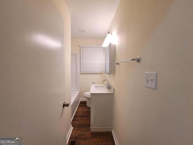1151 N Beddingfield Dr, Macon, GA 31206 - full bathroom with vanity and wood finished floors