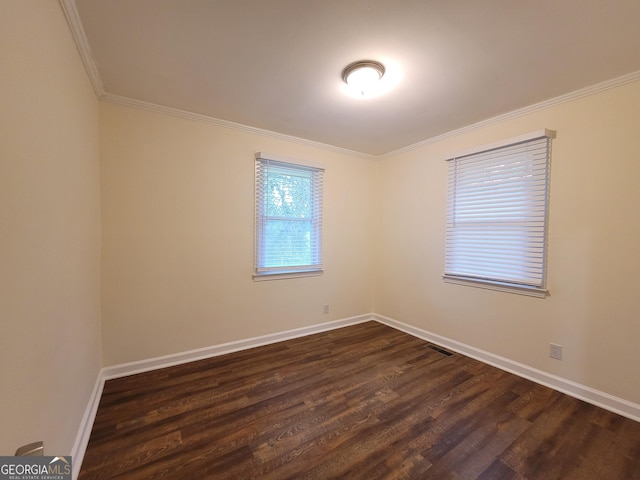 1151 N Beddingfield Dr, Macon, GA 31206 - spare room featuring crown molding and dark wood-style flooring