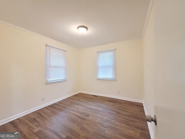 1151 N Beddingfield Dr, Macon, GA 31206 - unfurnished room with ornamental molding and dark wood-style floors