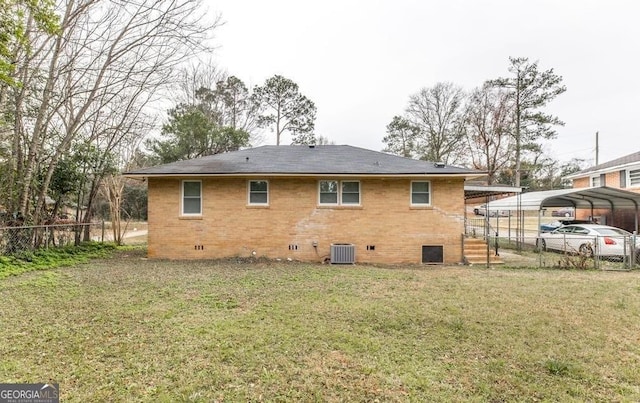 1151 N Beddingfield Dr, Macon, GA 31206 - rear view of property featuring crawl space, a detached carport, and brick siding