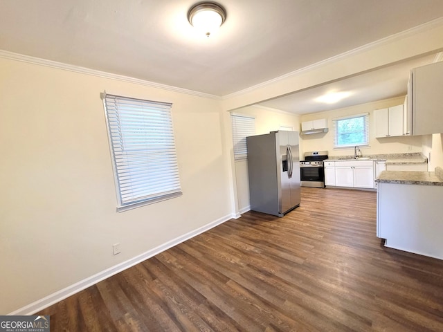 1151 N Beddingfield Dr, Macon, GA 31206 - kitchen featuring stainless steel appliances, dark wood-type flooring, white cabinets, crown molding, and light stone countertops