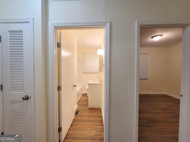 1151 N Beddingfield Dr, Macon, GA 31206 - hallway featuring wood finished floors and baseboards