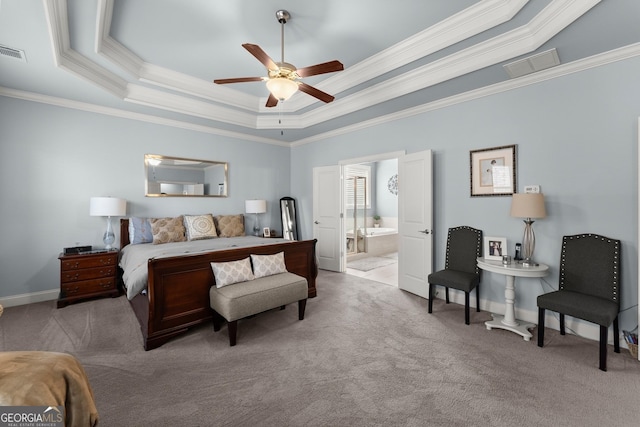 1351 Ashbury Park Dr, Hoschton, GA 30548 - bedroom with carpet floors, a raised ceiling, ornamental molding, ceiling fan, and connected bathroom