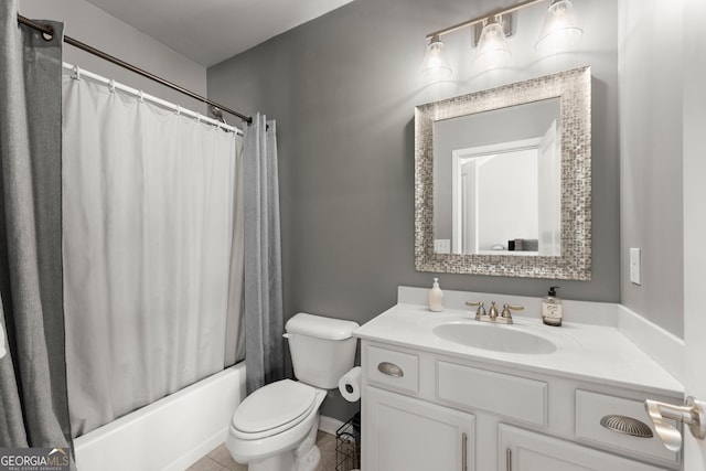 full bathroom featuring vanity, shower / tub combo, and toilet