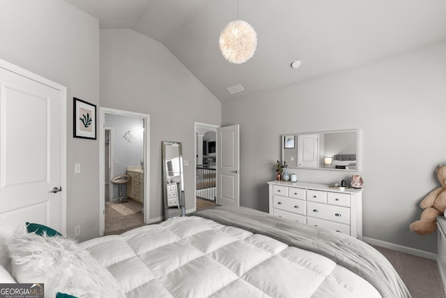 1351 Ashbury Park Dr, Hoschton, GA 30548 - bedroom with high vaulted ceiling, carpet flooring, and ensuite bath
