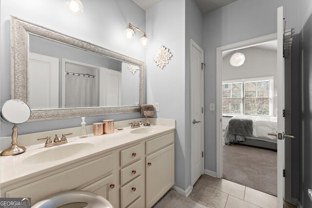 1351 Ashbury Park Dr, Hoschton, GA 30548 - ensuite bathroom featuring double vanity and tile patterned floors