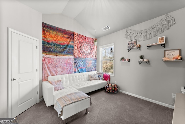living area featuring visible vents, carpet flooring, baseboards, and lofted ceiling