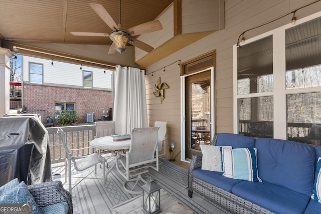 deck with grilling area, ceiling fan, and outdoor dining area