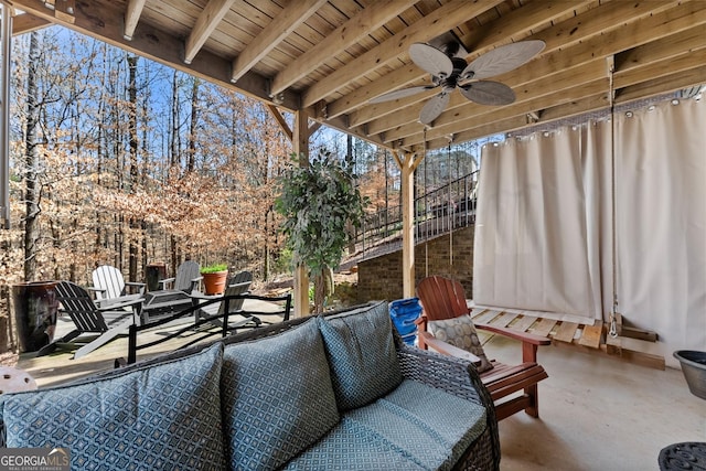 view of patio / terrace featuring ceiling fan