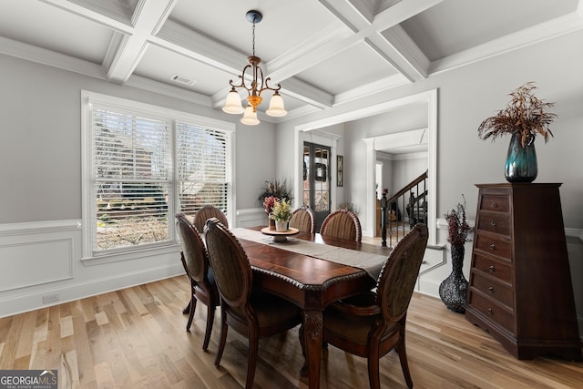 1351 Ashbury Park Dr, Hoschton, GA 30548 - dining room with a chandelier, coffered ceiling, light wood-type flooring, stairway, and beamed ceiling