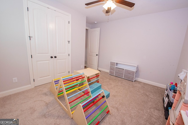 game room featuring a ceiling fan, carpet, and baseboards
