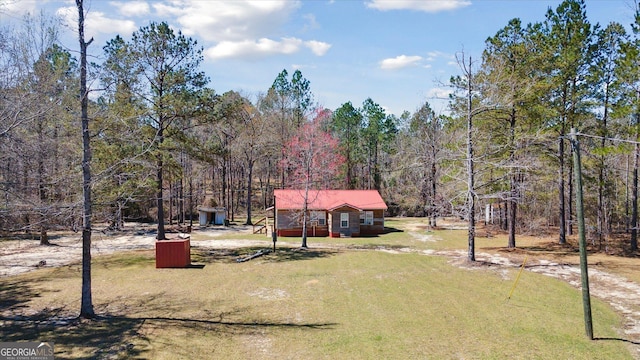 97 Meadow Rd, Swainsboro, GA 30401 - view of yard featuring a forest view